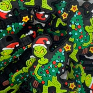 Christmas Grouch holding tree