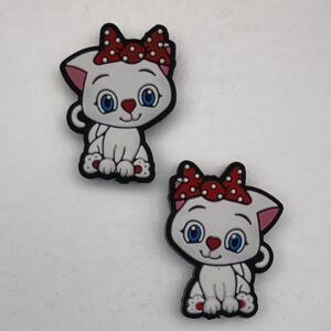 White cat w/red polka dot bow