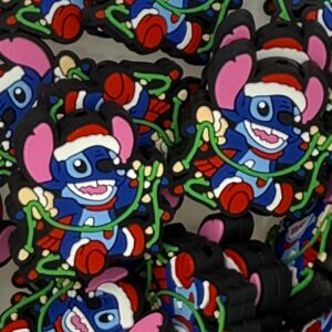 Blue guy holding Christmas lights